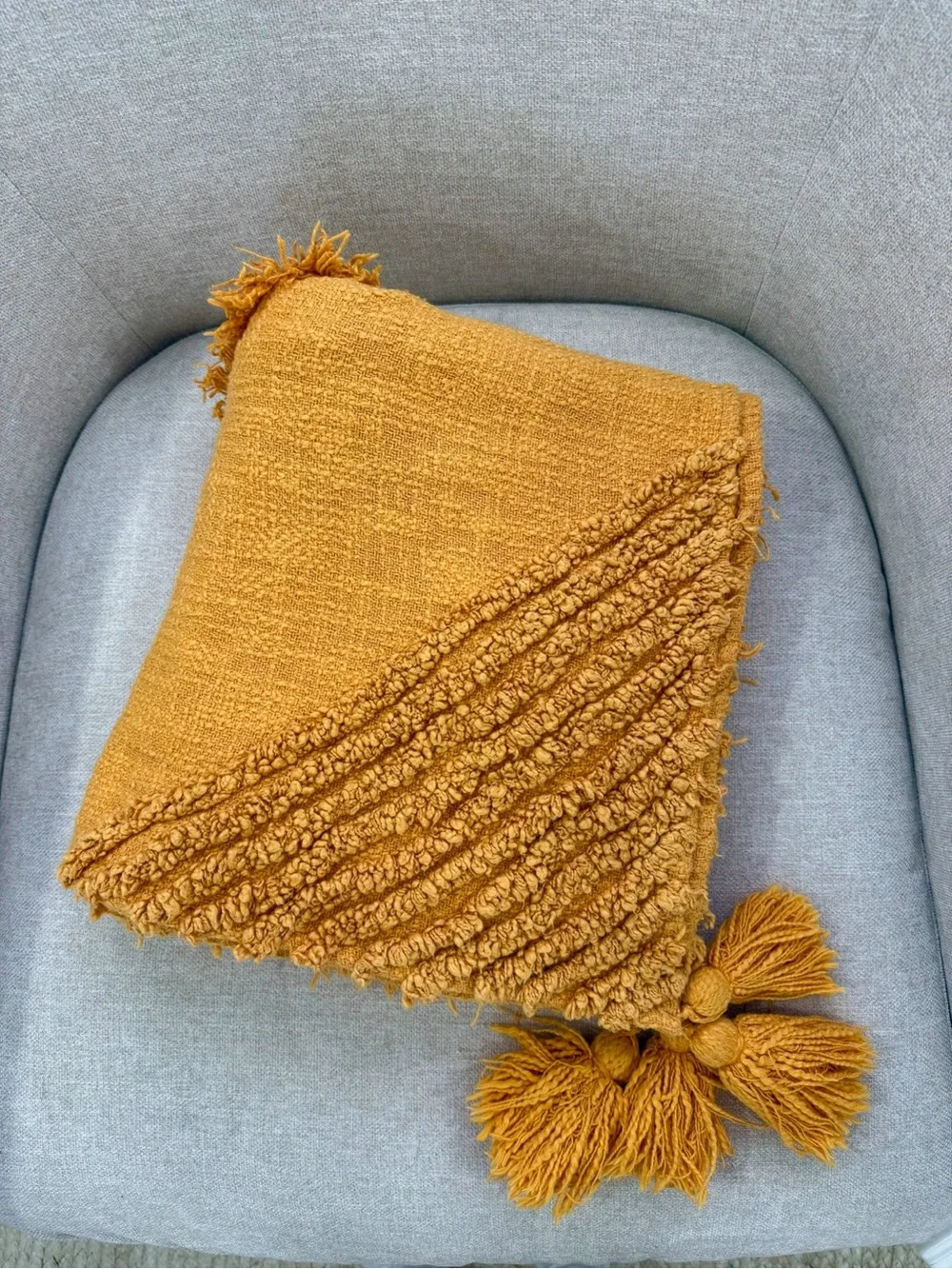 Urban Outfitters Aden Tufted Throw Blanket in Mustard